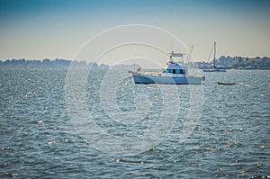 A Sports Fishing Boat at Anchor