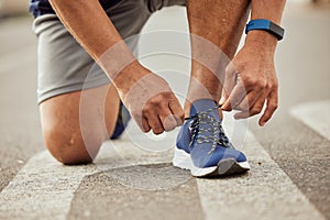 Sports, fitness or hands tie shoes to start training, cardio workout or exercise in city road. Legs, man or healthy