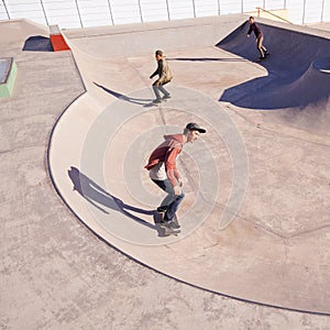 Sports, friends and men with skateboard, ramp or bowl action at a skate park for stunt training. Freedom, adrenaline and