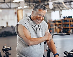 Sports, gym and injury, old man with arm pain, emergency during workout at fitness studio. Health, wellness and