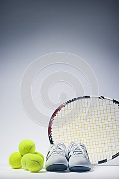 Sports Images Concepts: Tennis Raquet, Tennis Balls and Trainers photo