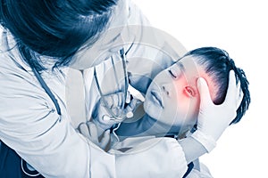Sports injury. Doctor give first aid at child`s eye with a bruis