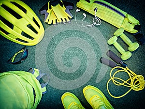 Sports kit background. Set of sports equipment with empty space in the center. Cycling, running, jumping on the ramp