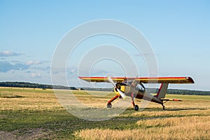 Sports light aircraft in the field landing takeoff,