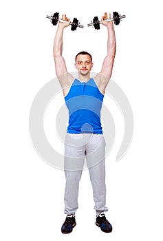 Sports man doing exercises with dumbbells