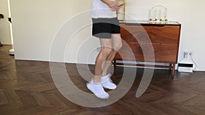 Sports man jumping rope, training after long break, rehabilitation, mid-section