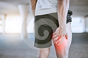 Sports man, runner and thigh injury to hamstring muscle for fitness, wellness and health person. Running, workout and