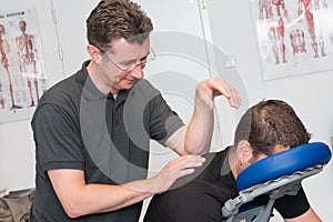 Sports massage therapist at work