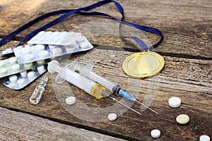 Sports medal and medicines