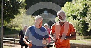 Sports, nature and senior men running in outdoor park for race, competition or marathon training. Fitness, exercise and