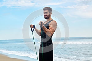 Sports. Portrait Of Man Exercising At Beach During Outdoor Workout