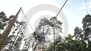 Sports and recreation. Bungee jumping sports. Leisure activities outdoor. Boy jumping high. Extreme games for children