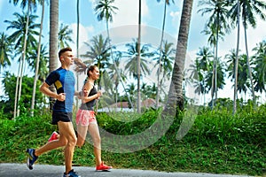 Sports. Runner Couple Running, Jogging On Road. Fitness, Healthy photo