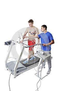 Sports Scientist doing Performance Assessment with Treadmill