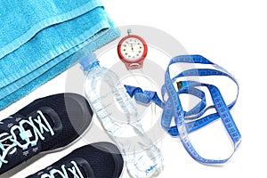 Sports shoes, water bottle, healthy lifestyle concept, healthy food, sports and diet.