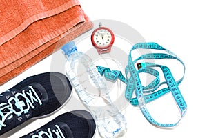 Sports shoes, water bottle, healthy lifestyle concept, healthy food, sports and diet