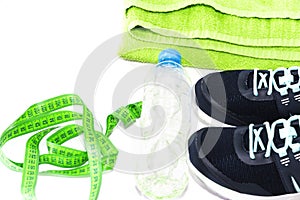 Sports shoes, water bottle, healthy lifestyle concept, healthy food, sports and diet