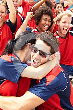 Sports Spectators In Team Colors Celebrating