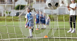 Sports team celebrate, soccer ball and goal of child at shooting practice for competition, kick aim or youth development