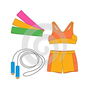 Sports top, shorts, sportswear, jump rope, rubber bands for training. Sport equipment. Fitness inventory