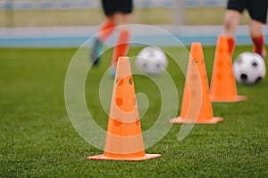 Sports training cones on soccer pitch