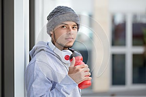 Sports training young latin man thinking emotion runner looking up copyspace copy space