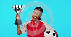 Sports winner, trophy and excited woman with soccer player award, match competition victory or football achievement