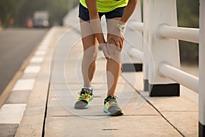 Sports woman injuries on running