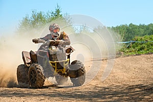 The sportsman is on a bend in the dust