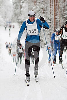 Sportsman in classic style cross country skiing race