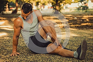 Sportsman doing stretching exercise