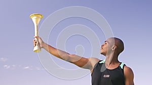 Sportsman with olympic torch