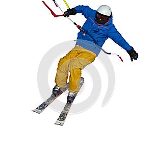 A sportsman practicing snow kiting jumping, isolated on white background.