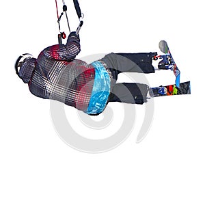 A sportsman practicing snow kiting jumping, isolated on white background