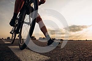 Sportsman relaxing on bike after long ride