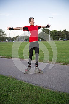 Sportsman on roller skates stand for warming