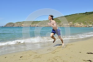 Sportsman running on the beach