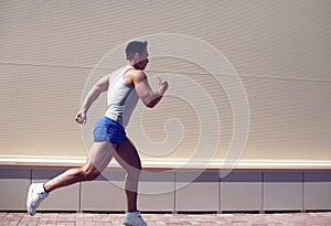 Sportsman running in the city, lifestyle, workout