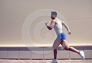 Sportsman running in the city, sport, workout, healthy lifestyle