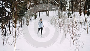 Sportsman running in forest