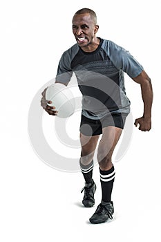 Sportsman running while playing rugby
