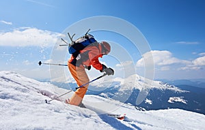 Sportsman skier in bright clothing, helmet and goggles with backpack riding down steep snowy slope.