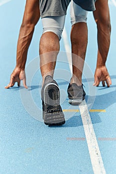 Sportsman standing in starting position while taking part in the competition