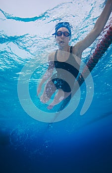 Sportsman swimming in crawl style