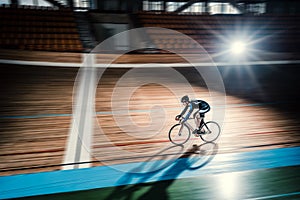 Sportsman on a velodrome photo