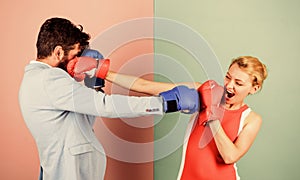 Sportswear. knockout punching. who is right. win the fight. Strength and power. bearded man hipster fighting with woman