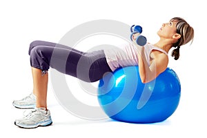 Sportswoman exercising on a Fitness Ball