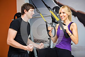 Sportswoman exercising with a resistance band