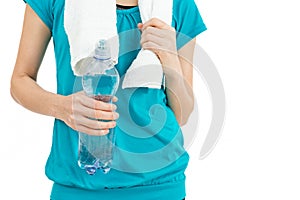 Sportswoman holding a bottle of water in her hand