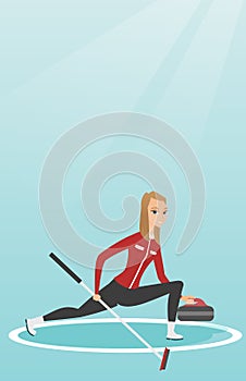 Sportswoman playing curling on a skating rink.